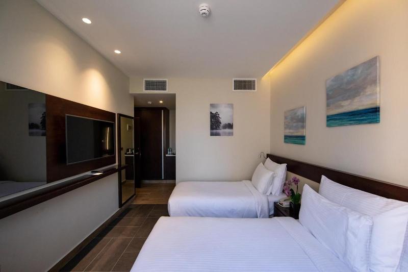 The Compass Hotel - Oda