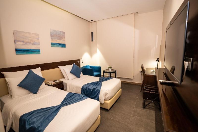 The Compass Hotel - Oda