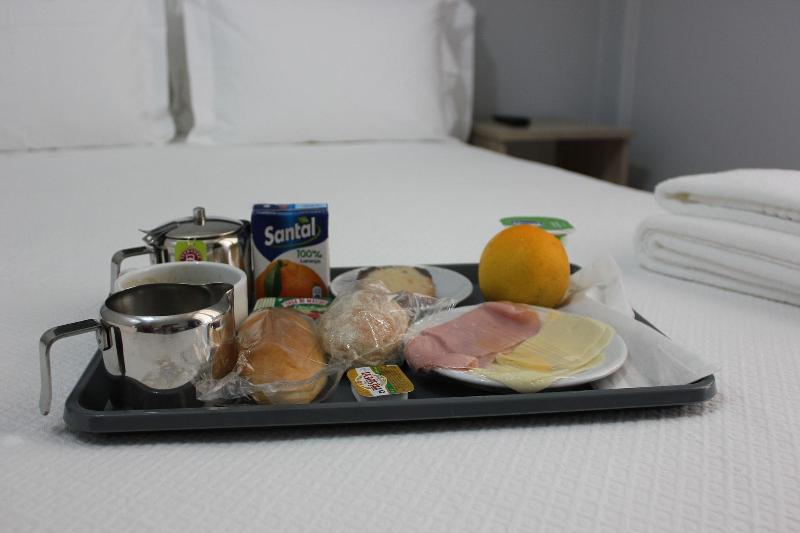 O Elétrico Guesthouse - Restoran