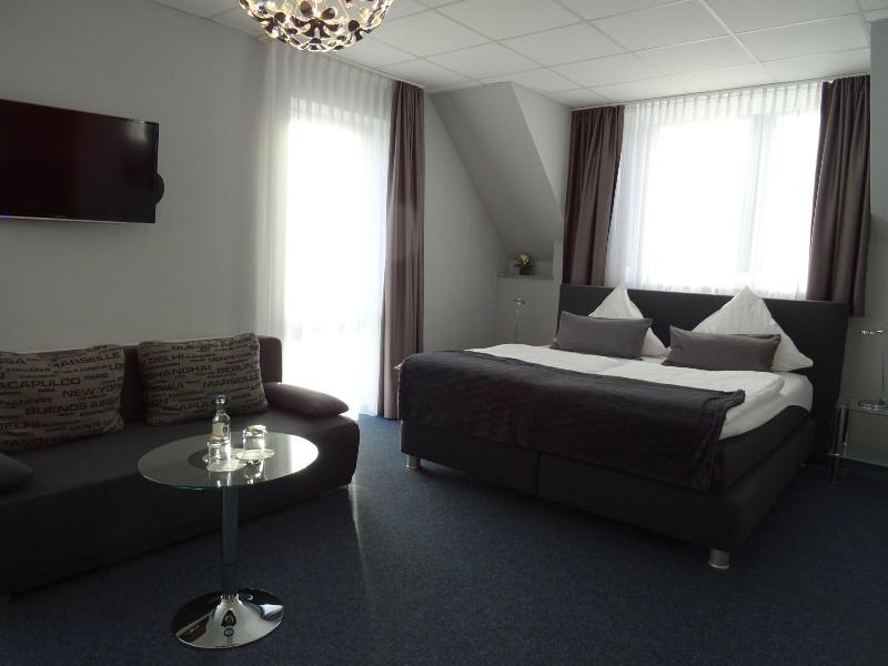 KOMM' IN Hotel - Oda