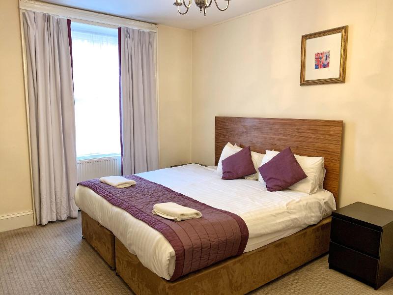 Cairn Hotel - Oda