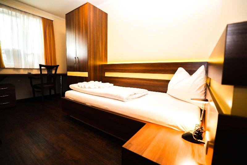 Primus Hotel & Apartments - Oda