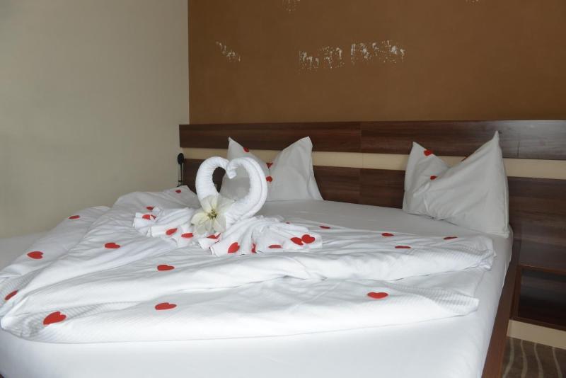 Primus Hotel & Apartments - Oda