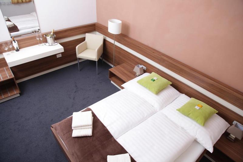 Primus Hotel & Apartments - Oda