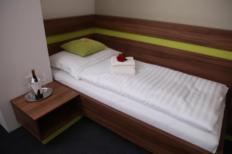Primus Hotel & Apartments - Oda