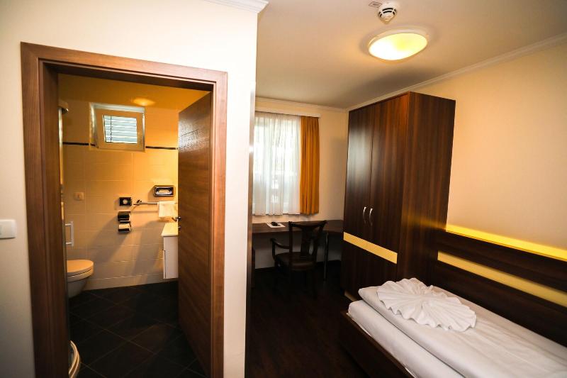 Primus Hotel & Apartments - Oda