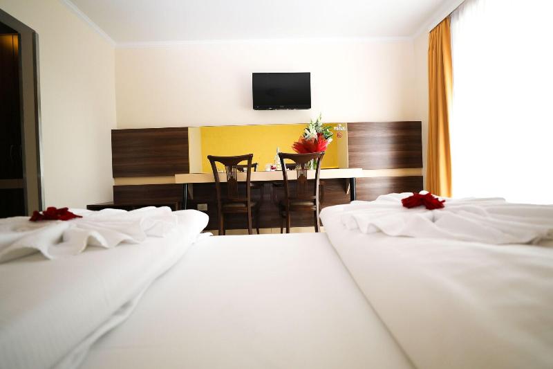 Primus Hotel & Apartments - Oda