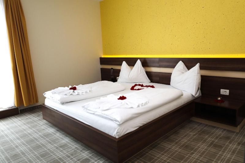 Primus Hotel & Apartments - Oda