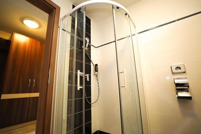 Primus Hotel & Apartments - Oda