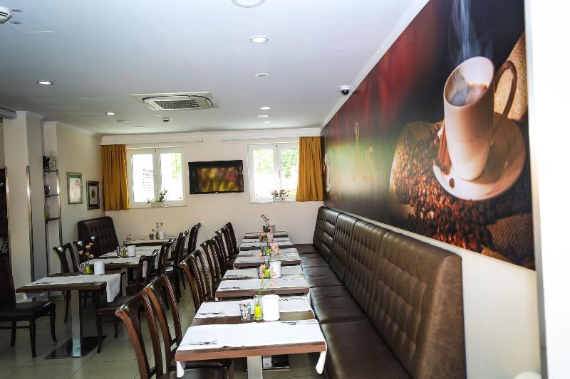 Primus Hotel & Apartments - Restoran