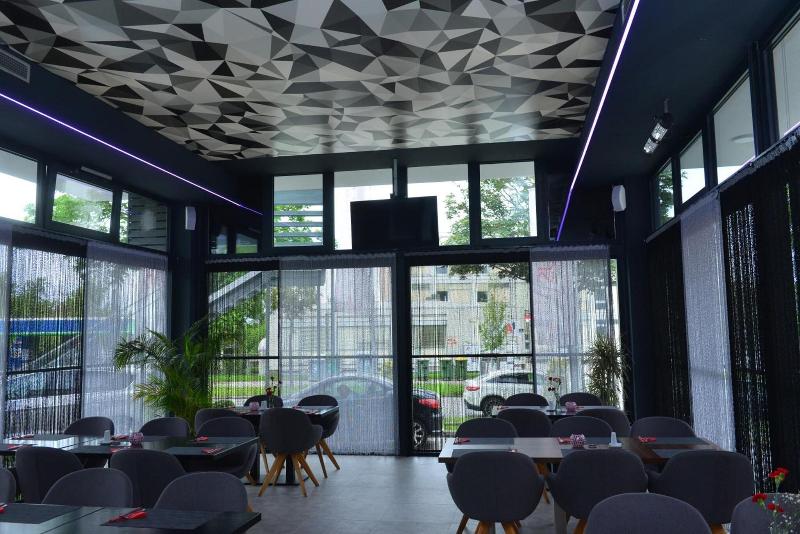 Primus Hotel & Apartments - Restoran