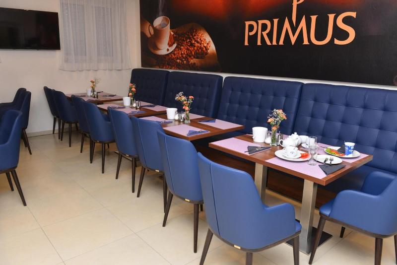 Primus Hotel & Apartments - Restoran