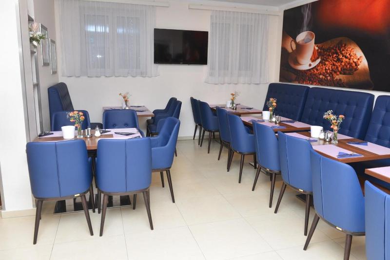 Primus Hotel & Apartments - Restoran
