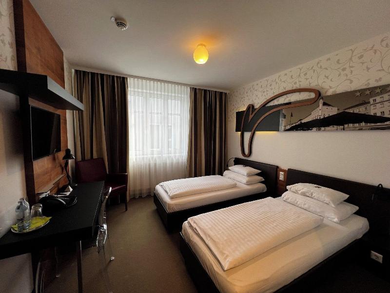 H+ Hotel Ried - Oda