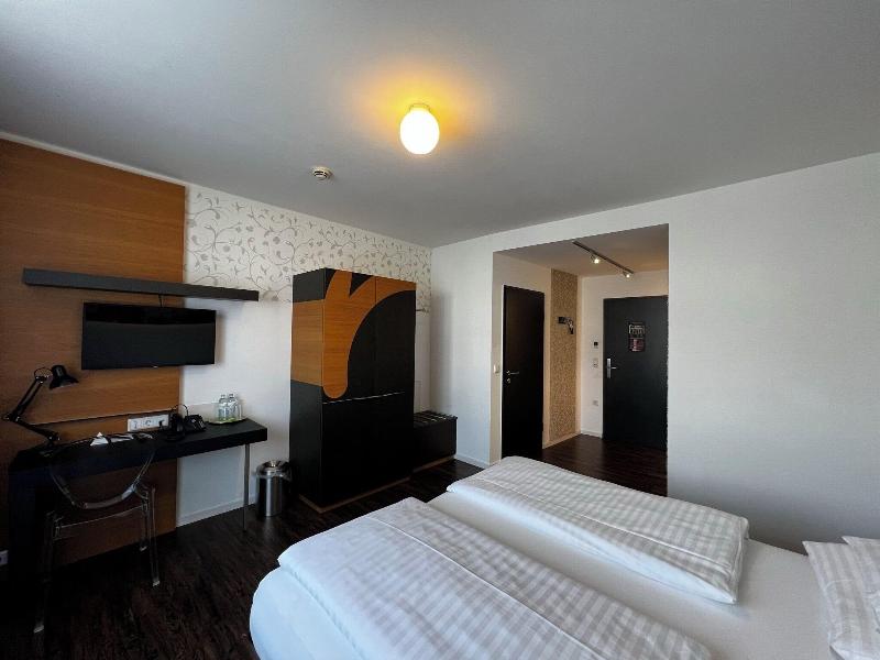 H+ Hotel Ried - Oda