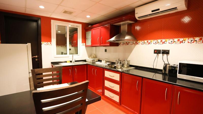 Remas Hotel Suites - Oda