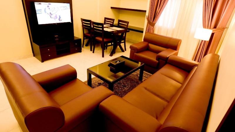 Remas Hotel Suites - Oda
