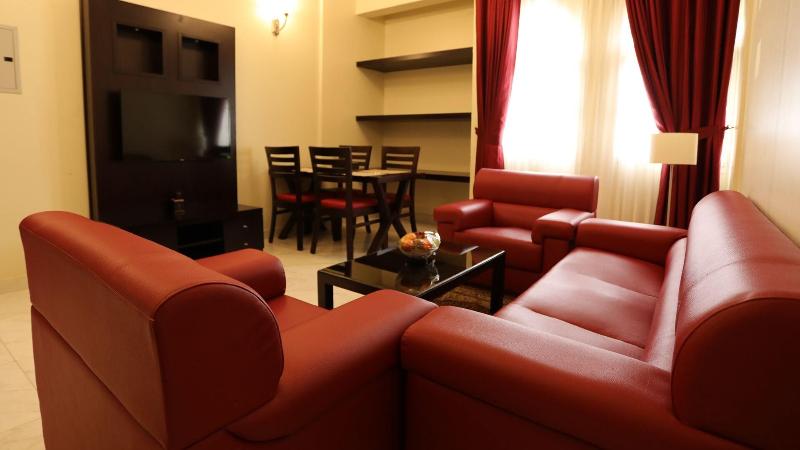 Remas Hotel Suites - Oda