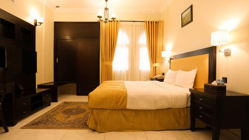 Remas Hotel Suites - Oda