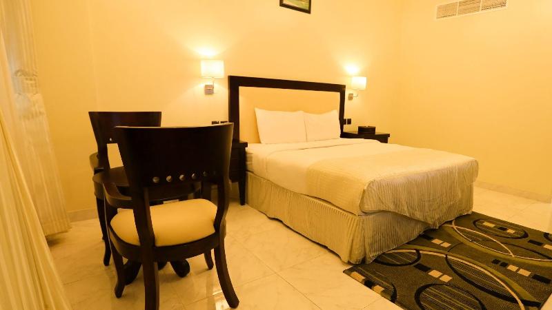 Remas Hotel Suites - Oda