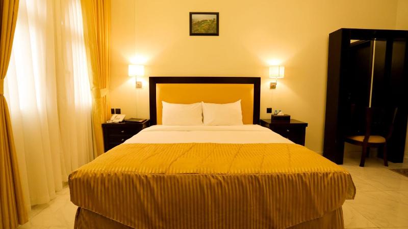 Remas Hotel Suites - Oda