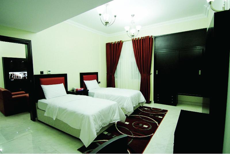 Remas Hotel Suites - Oda