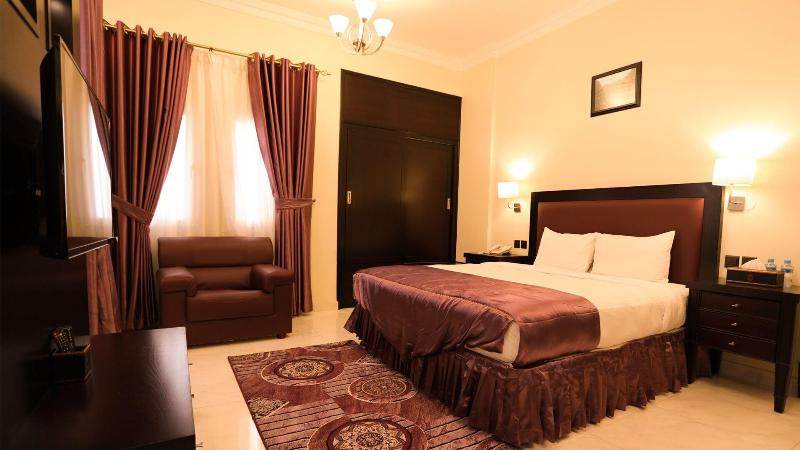 Remas Hotel Suites - Oda