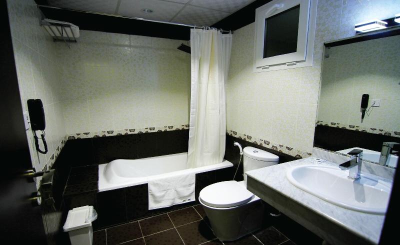 Remas Hotel Suites - Oda