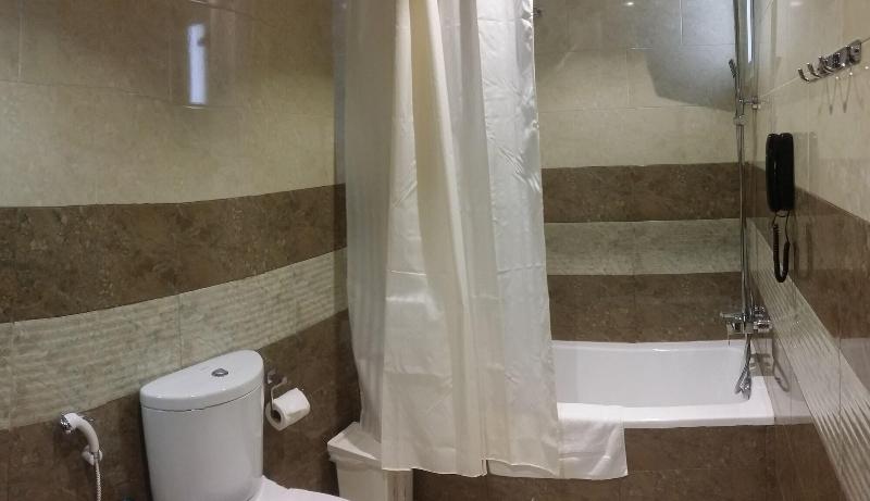 Remas Hotel Suites - Oda