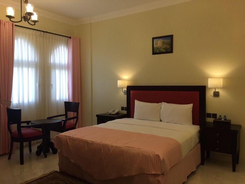 Remas Hotel Suites - Oda