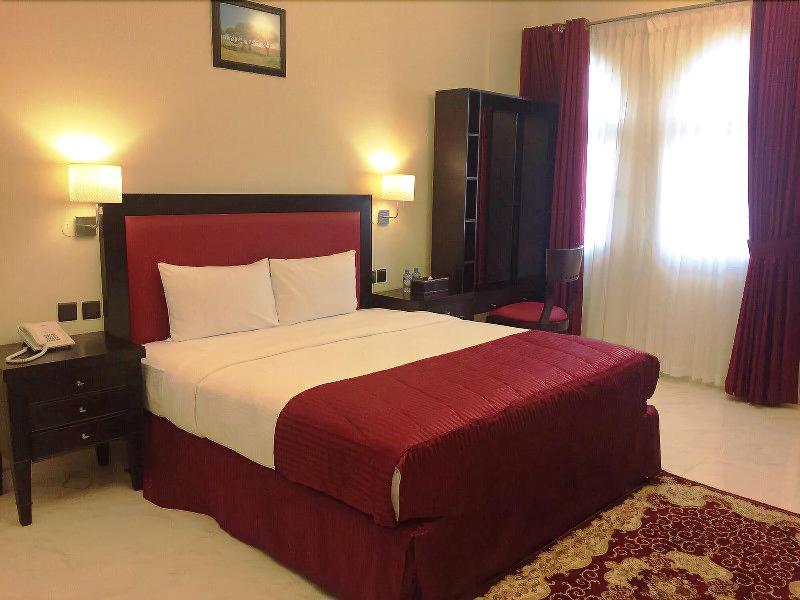 Remas Hotel Suites - Oda