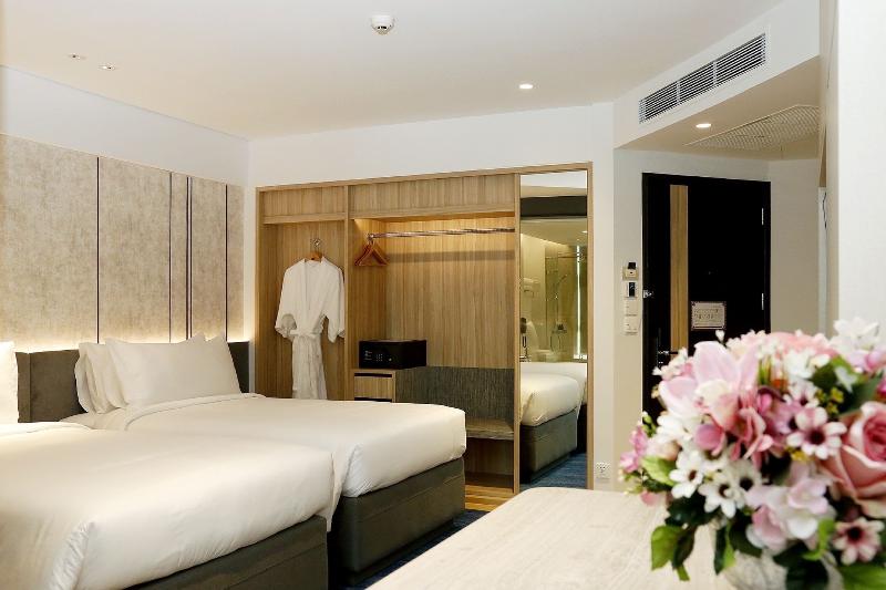 Miracle Grand Convention Hotel - Oda