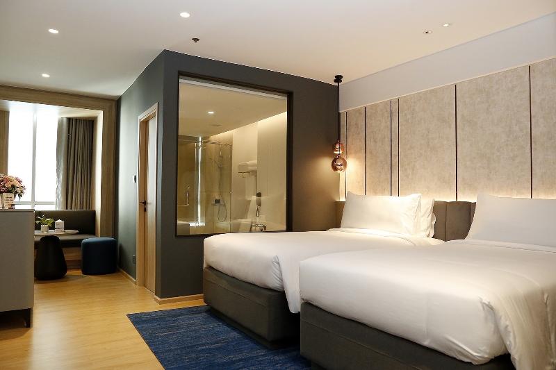 Miracle Grand Convention Hotel - Oda