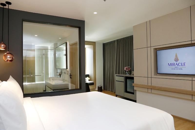 Miracle Grand Convention Hotel - Oda