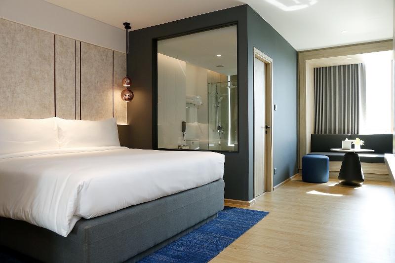 Miracle Grand Convention Hotel - Oda
