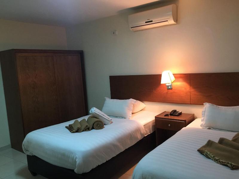 Zaina Plaza Hotel - Oda