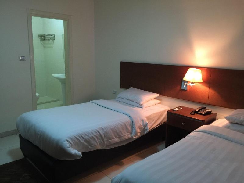 Zaina Plaza Hotel - Oda