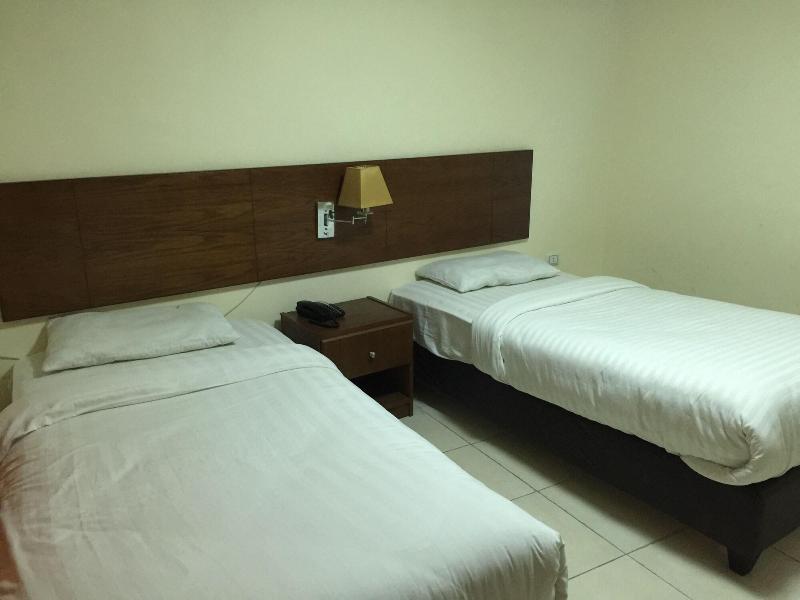 Zaina Plaza Hotel - Oda
