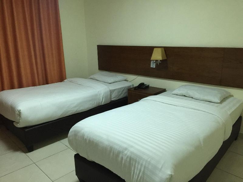 Zaina Plaza Hotel - Oda