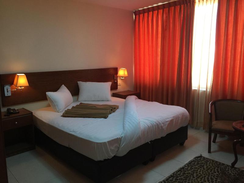 Zaina Plaza Hotel - Oda