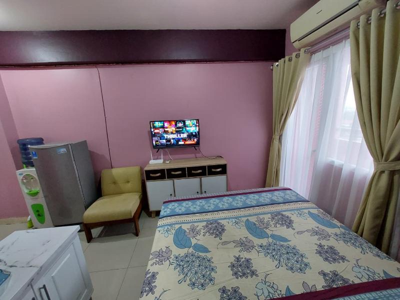 Green Pramuka Apartement By Vici by ZUZU - Oda