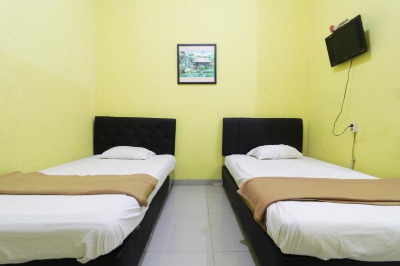 Hotel Surabaya Jaya Bandara Soetta by ZUZU - Oda