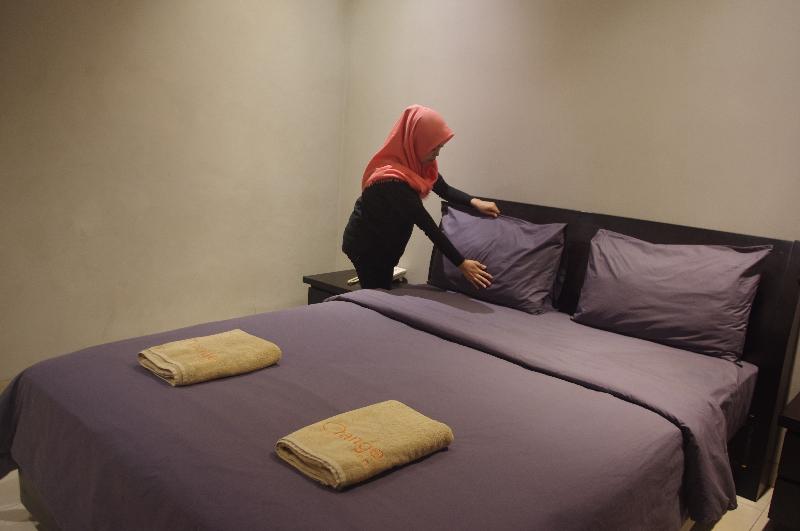 Orange Inn Hotel Mangga Besar by ZUZU - Oda