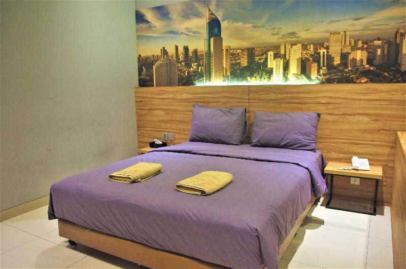 Orange Inn Hotel Mangga Besar by ZUZU - Oda