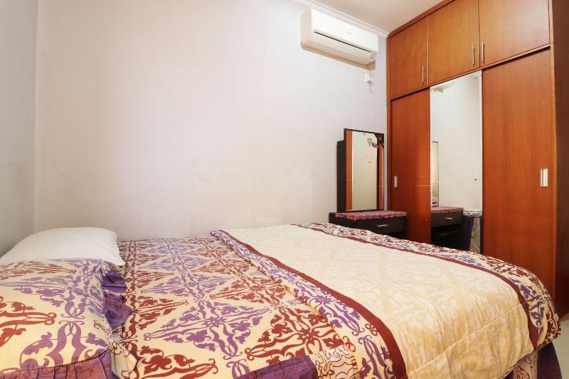 Rent House Center at Apartmen Mediterania by ZUZU - Oda