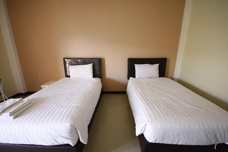 Charoensuk Grand Hotel - Oda