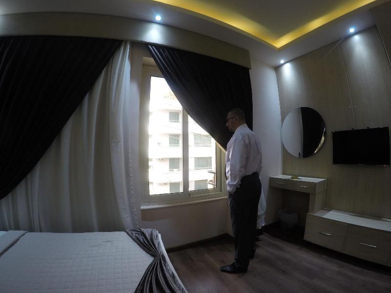 Grand City Hotel - Oda