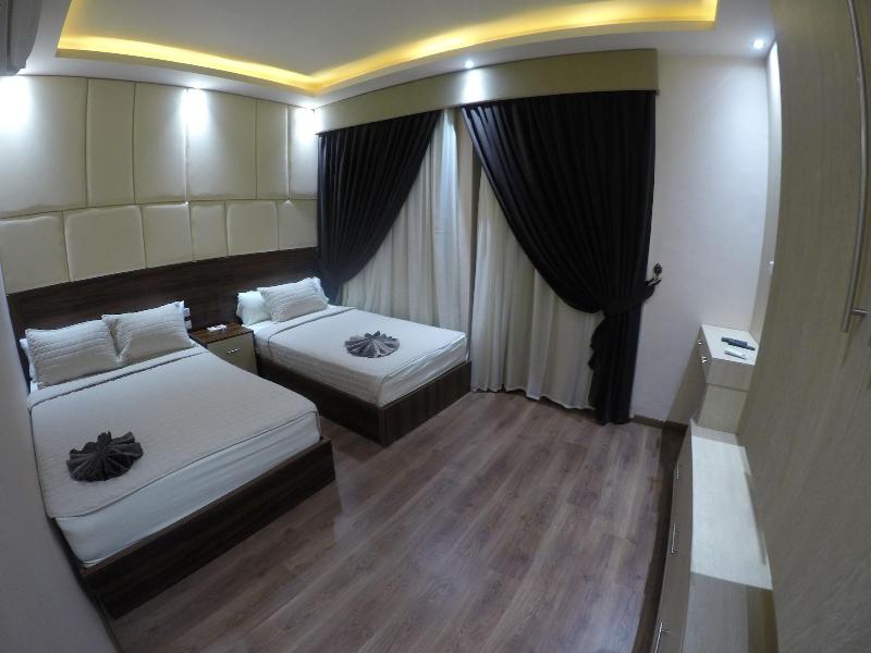 Grand City Hotel - Oda