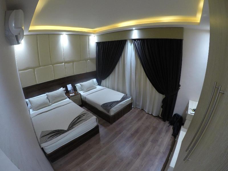 Grand City Hotel - Oda