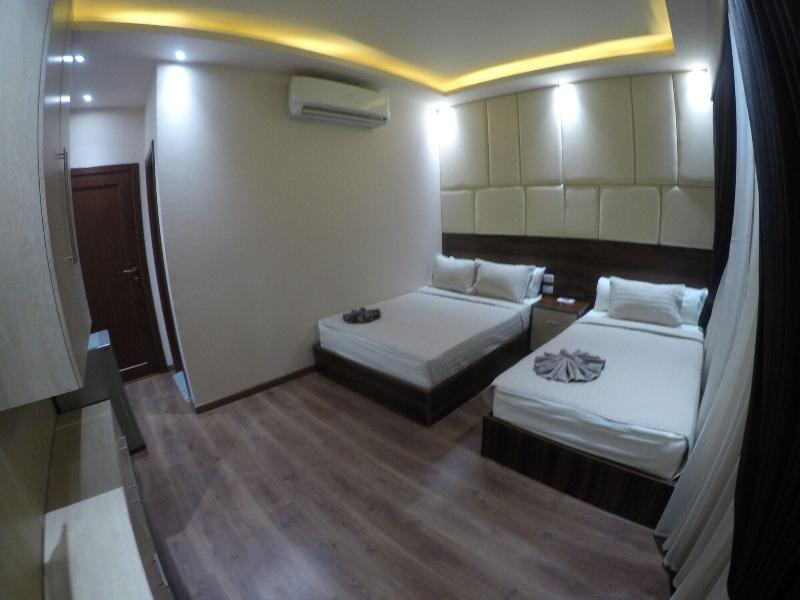 Grand City Hotel - Oda